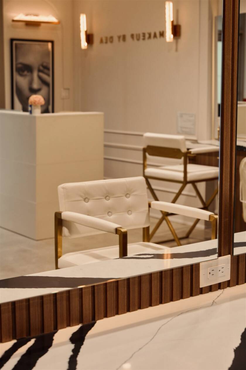 Reception desk and makeup chairs at Makeup By Dea studio