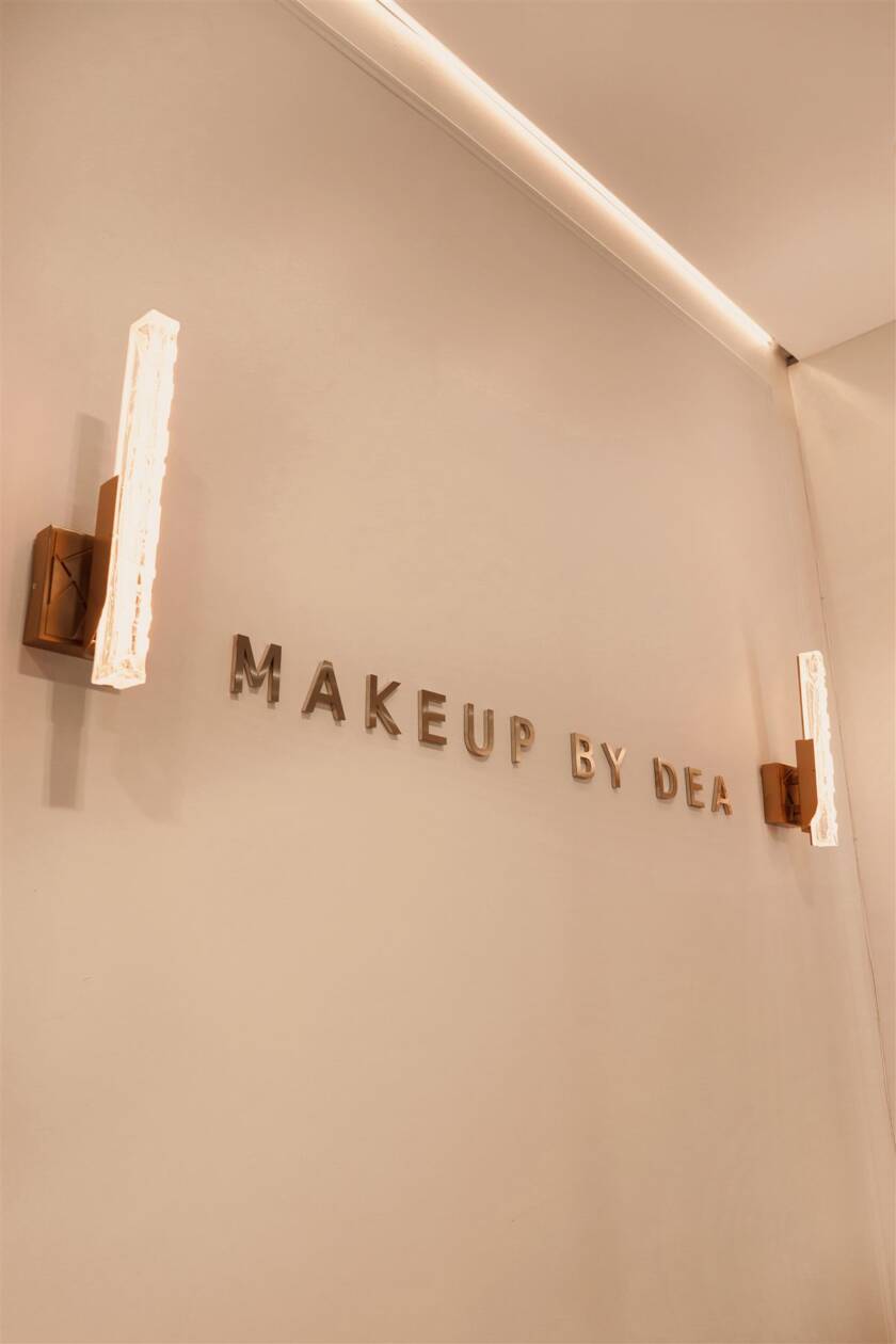 Makeup By Dea illuminated logo wall